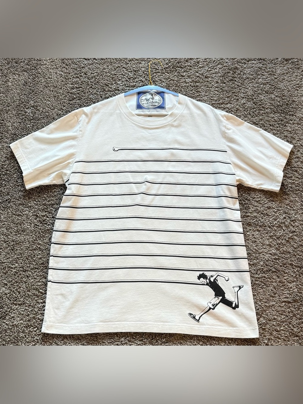 Uniqlo White Short-Sleeve Striped Tee with Running Figure Graphic